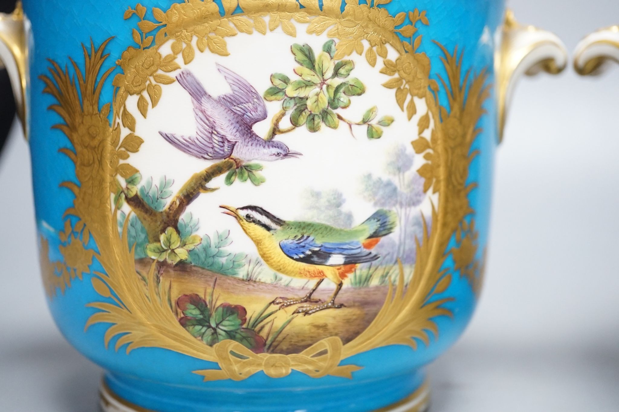 A pair of mid 19th century English porcelain cache pots, 14.5 cms high.